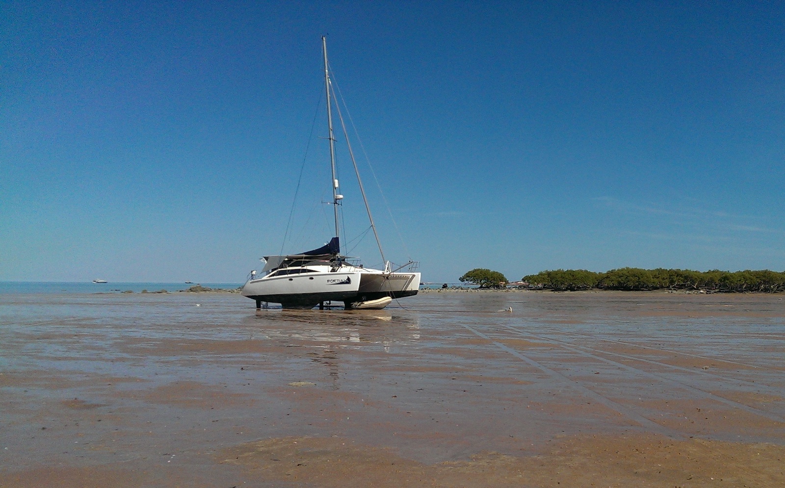 40 foot sailing catamaran high and dry at low tide in the Northern Territory during a coastal yacht delivery. 