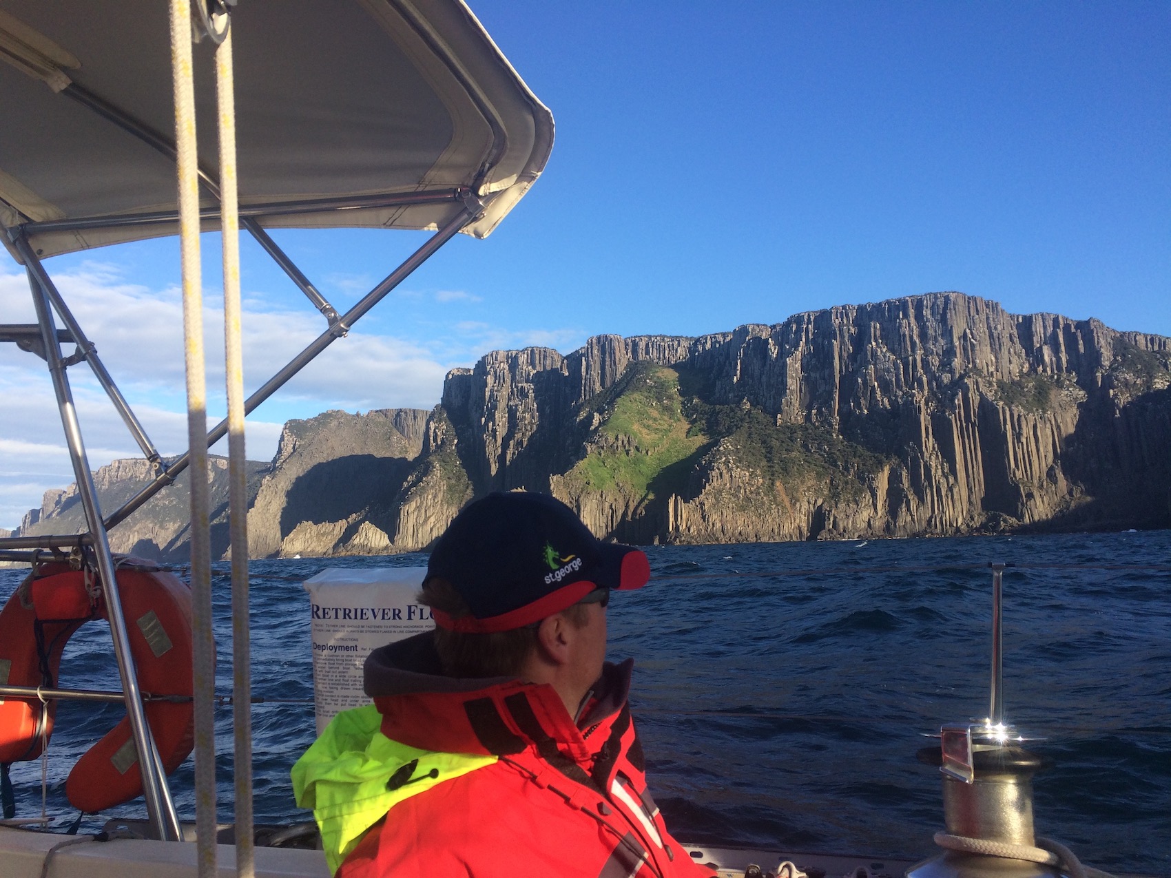 View from the helm of a 44 foot yacht tracking North from Hobart, Tasmania, Australia. 