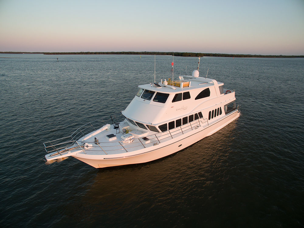 76 foot motor cruiser departing on delivery from Airlie Beach, QLD to the Gold Coast, QLD, Australia. 