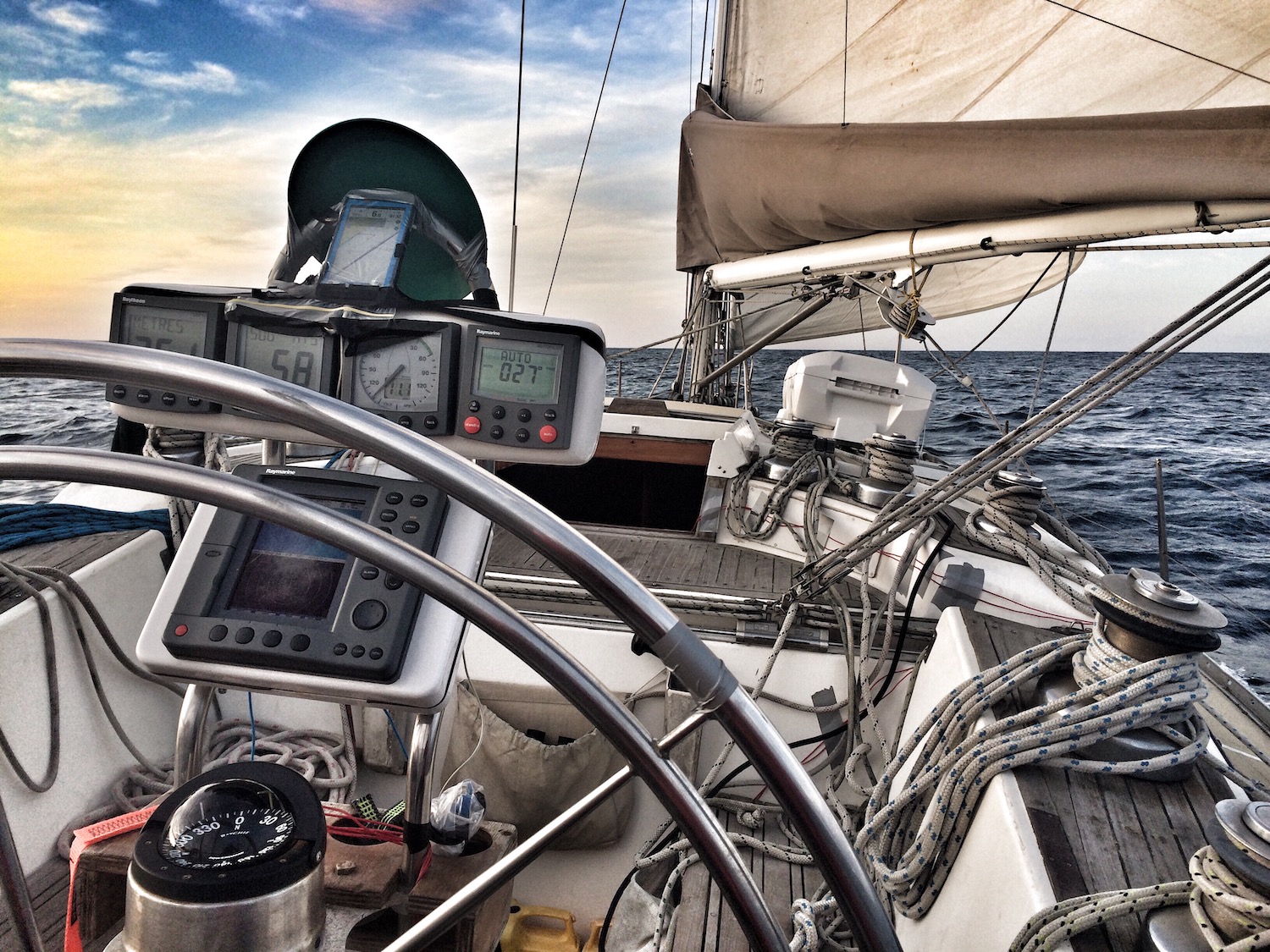 Skipper view from the helm onboard an Adams 40 foot sailing sloop, from Melbourne Victoria to Sydney, NSW, Australia. 